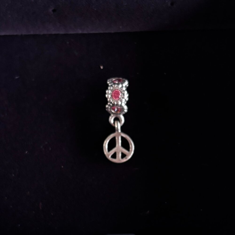 Pandora Retired Peace Dangle with Pink Stones